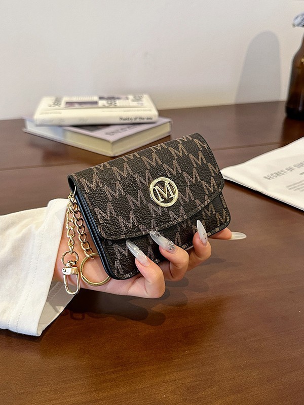 حافظة بطاقات من الجلد الصناعي  - مراجعة Monogram Keychain Leather وسعره